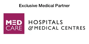 Logo of MedCare, an exclusive medical partner, with bold letters on a purple background and the text above reading Exclusive Medical Partner.