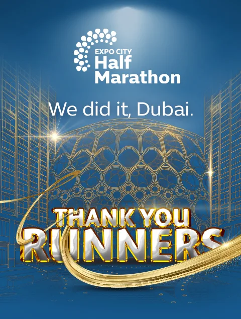 Expo City Half Marathon logo with the message We did it, Dubai. Thank you runners on a blue ornate background with gold accents.