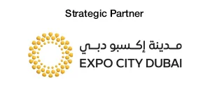 Logo for Expo City Dubai, labeled as Strategic Partner, featuring a circular design with dots and Arabic script.